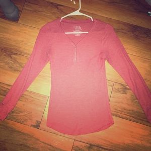 Maroon long sleeved top.